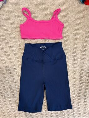 Year of Ours Pink Ribbed sports bra & Navy Ribbed Bike Shorts Set